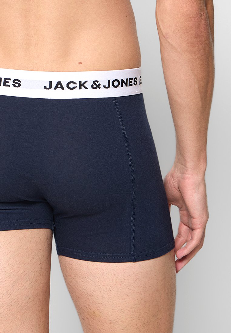 Boxer briefs blu navy realizzati in un misto cotone elasticizzato, con una vita elastica bianca con il logo "JACK & JONES". Cuciture piatte per il comfort.