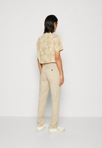 Antony Morato TROUSERS MARK SLIM FIT - Hlače chino - sand