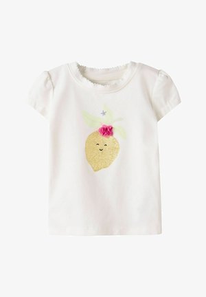White toddler T-shirt with puff sleeves featuring a glittery lemon graphic with a smiling face and a pink fabric flower on top.