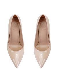 Babouches en cuir verni nude à talons hauts avec un design à bout pointu. Texture lisse et logo minimaliste sur la semelle intérieure.