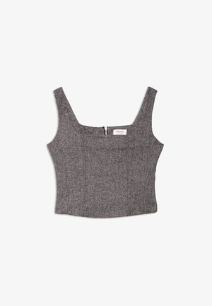 Crop top en chevrons gris avec larges bretelles, décolleté carré et fermeture éclair au dos. Fabriqué en tissu texturé, il est conçu pour s'ajuster parfaitement.