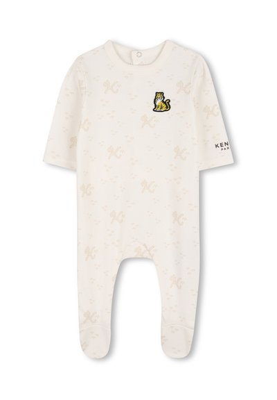 Body per neonati color crema in tessuto morbido, con toppa a forma di tigre, motivi testurizzati sottili, maniche corte e piedi coperti.