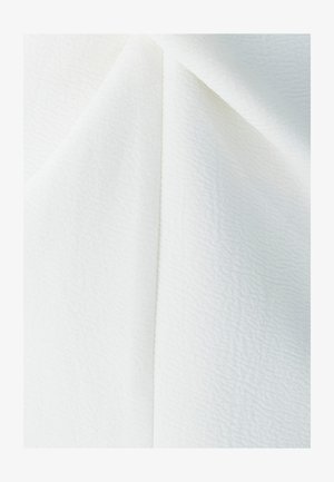 White textile with a subtle textured pattern, featuring soft draping and smooth, even surface. Pleats create gentle folds.
