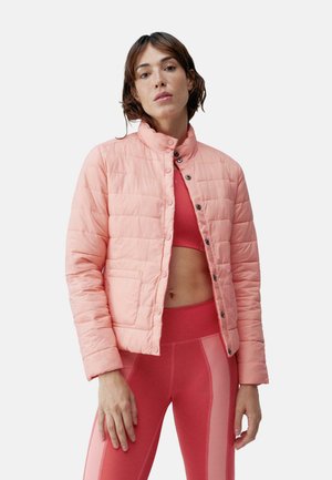 Light pink puffer jacket with a collar, snap button closure, and horizontal quilting. Features a side pocket and lightweight fabric.