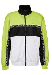 Chaqueta con cremallera en verde, negro y blanco, con cuello alto, puños elásticos y bolsillos laterales. Presenta un logo y cinta con patrón a lo largo de las costuras.