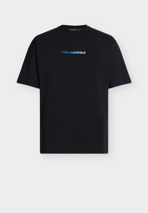 T-shirt nera a maniche corte con piccolo logo blu “KARL LAGERFELD” al centro del petto, scollo rotondo e vestibilità regolare.