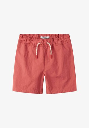 Korallenfarbene Shorts mit elastischem Bund und weißem Kordelzug mit orangen Akzenten, knielang, leichte Stoffqualität, lässiger Stil.