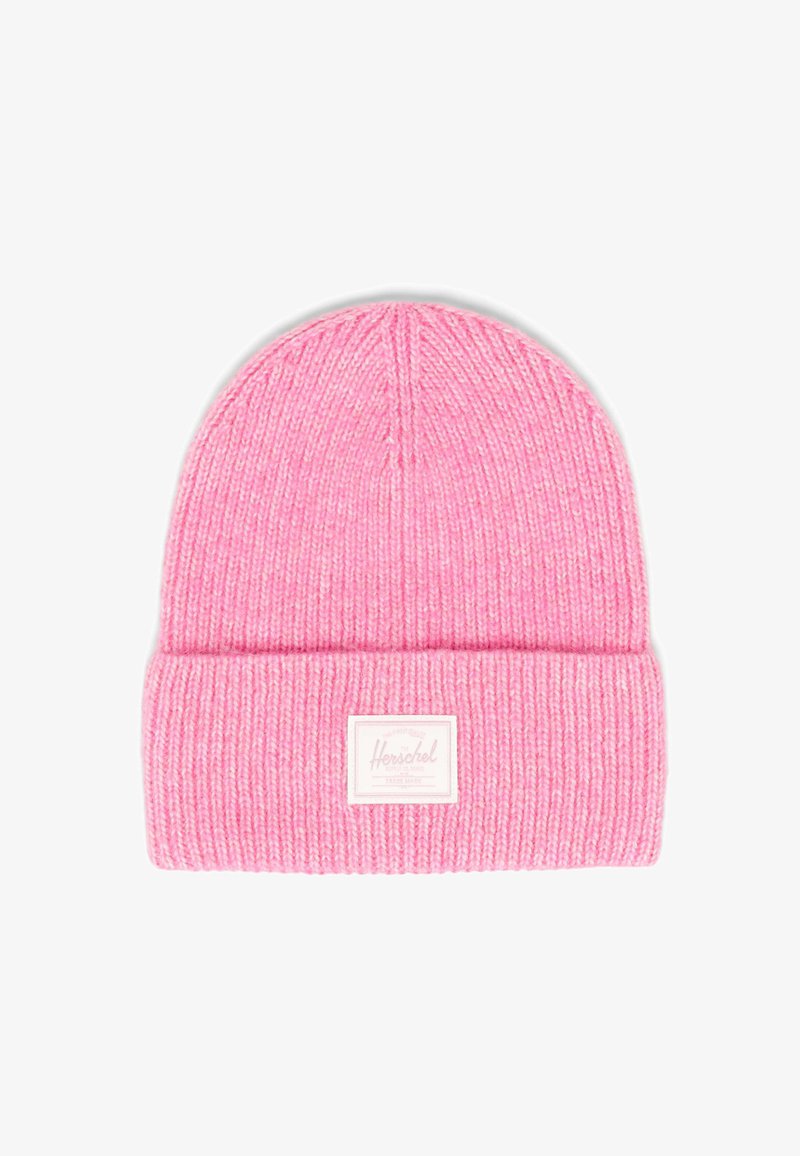 Pink knitted beanie with a fold-over cuff, featuring a white patch with branding. Soft texture and ribbed design.
