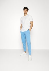 GAP HERITAGE LOGO - Calças de fato de treino - union blue