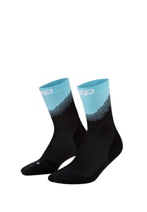 Pair of black and light blue athletic socks with a textured pattern and white text near the top cuff.