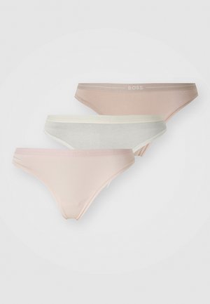 Three women's thong underwear in light colors: light pink, white, and light grey. Made of smooth fabric with a soft waistband featuring 'BOSS' logo.