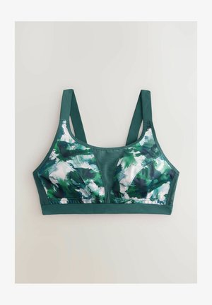 Reggiseno sportivo verde con un motivo ad acquerello di verdi scuri e chiari, dotato di spalline larghe e tessuto testurizzato per supporto e comfort.