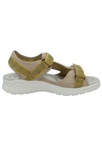 Beige sandals with a structured mesh design, featuring yellow and blue patterned straps. Thick white rubber sole for comfort and support.