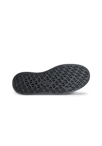 Black rubber shoe sole with a diamond pattern texture, featuring embossed logo and size details for grip and traction.