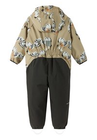 Barns tvåfärgade jumpsuit i beige och svart med ett fiskmås-mönster på överdelen och elastiska muddar vid handleder och anklar.