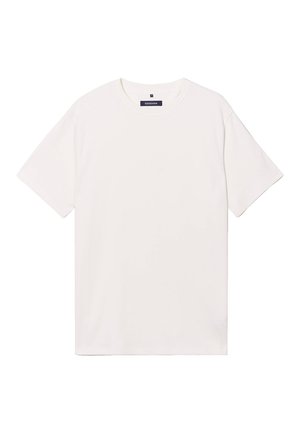 T-shirt blanc à manches courtes en coton. Doté d'un col rond avec une texture côtelée et d'une coupe droite à l'ourlet.