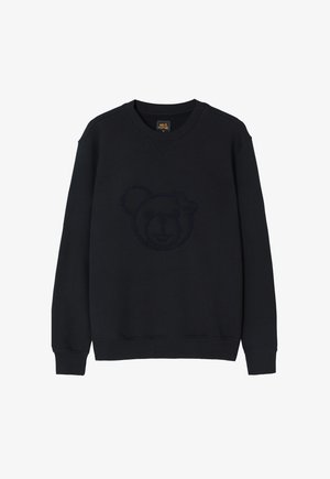 Sort sweatshirt med et tekstureret bjørneansigt design i midten. Den har en rund hals, lange ærmer og ribbede manchetter og kant.