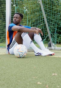 adidas Performance COPA PURE 2.0 ELITE FIRM GROUND - Scarpe da calcio per terreni duri - footwear white/lucid blue/solar red