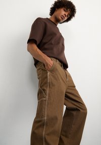 Dickies STEVENSVILLE  - Dailidės stiliaus džinsai - mushroom