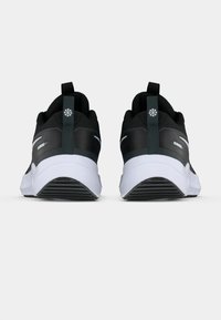 Pair of black and white running shoes shown from the back, featuring pull tabs and reflective details on a white background.