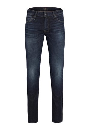 Mørkeblå slim-fit herrejeans med frontlommer, bæltestropper og let fading på lår og knæ.