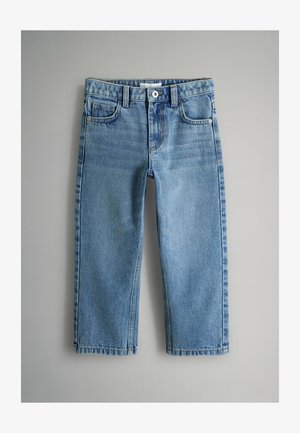 Gaiši zili džinsa džinsi ar taisnu kāju un vidēja augstuma jostasvietu, ar piecām kabatām un kontrastējošu šuvju apdari. Nav redzamu apdares elementu.