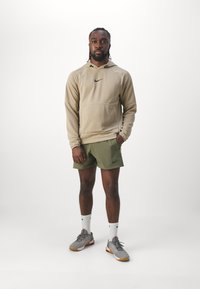 Nike Performance FLEX REP - Pantalón corto de deporte - medium olive/black