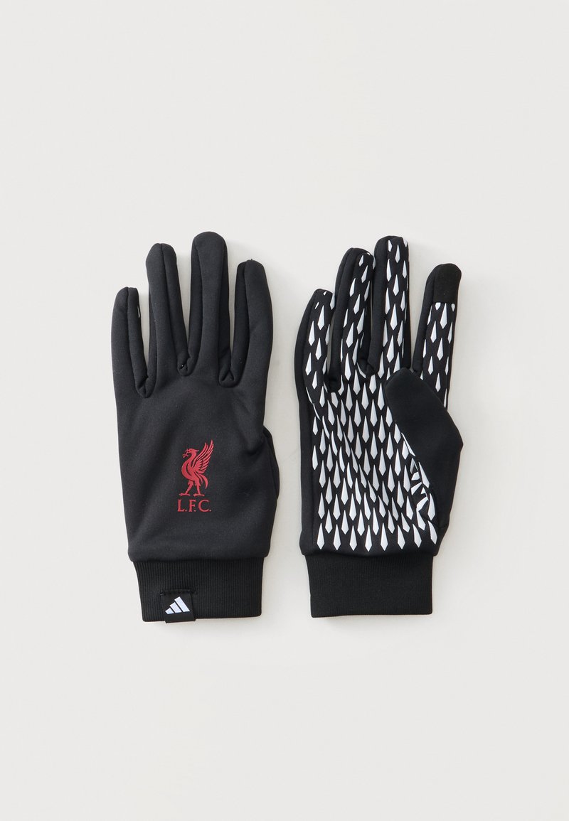 Μαύρα γάντια με το λογότυπο της Liverpool FC σε ένα γάντι και λευκό μοτίβο λαβής στην παλάμη του άλλου, τοποθετημένα επίπεδα σε ανοιχτό φόντο.