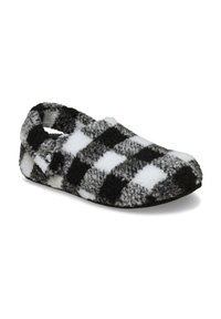 Pantofole in pile a scacchi bianco e nero con una texture morbida, design slip-on arrotondato e suola piatta per il comfort indoor.