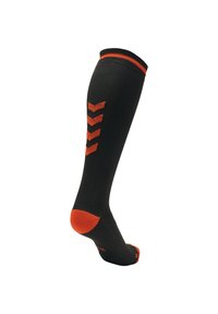 Calza nera fino al ginocchio con dettagli arancioni e un motivo a zigzag lungo il lato. Presenta un tessuto testurizzato e una punta e un tallone di colore solido.