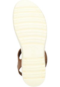 Sandalia de cuero marrón con un diseño abierto. Presenta una suela de goma blanca texturizada con un patrón estriado para mayor agarre. Diseño enfocado en la comodidad.