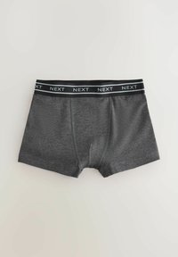 Boxer pour homme gris foncé avec une ceinture élastique noire portant la marque "NEXT" en texte blanc, posé à plat sur un fond clair.