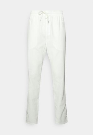 Pantalon blanc léger avec taille élastique et cordon de serrage, coupe droite, adapté pour une tenue décontractée.