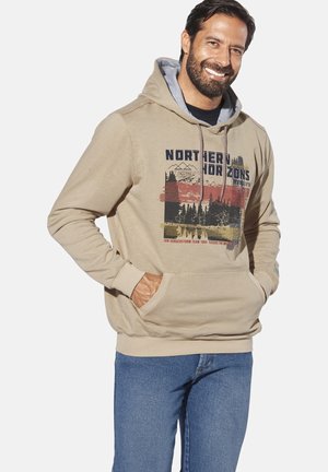 Beiger Hoodie mit grauem Kapuzenfutter, Vorderfach und grafischem Design mit Bergen und Bäumen. Aus Baumwolle, lässige Passform.