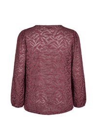 Maglietta a maniche lunghe color mogano con un design testurizzato e a fantasia. Presenta un collo rotondo e maniche arricciate. Tessuto leggero con un effetto scintillante.
