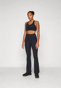 Champion SOFT TOUCH BRA LIGHT SUPPORT WITH LARGE LOGO - Sujetadores deportivos con sujeción ligera - black