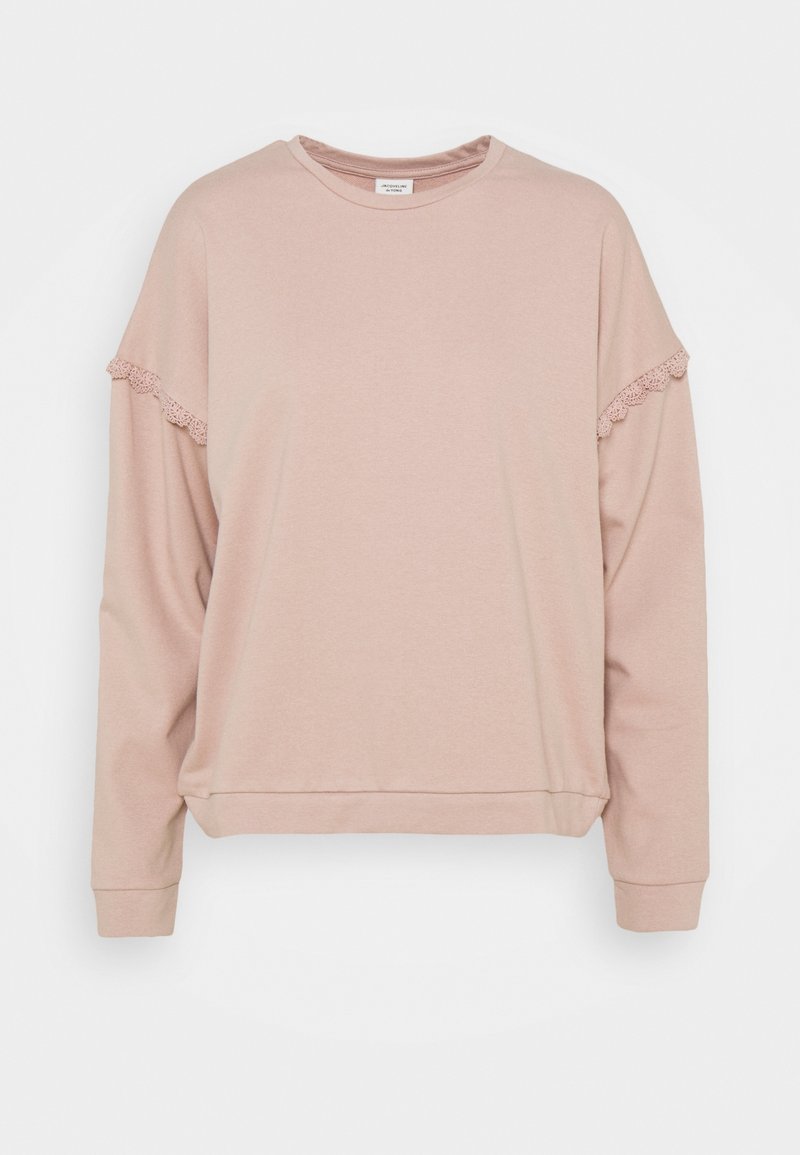 Pink sweatshirt featuring long sleeves, a round neckline, and lace detailing on the shoulders. Made of soft, textured fabric.