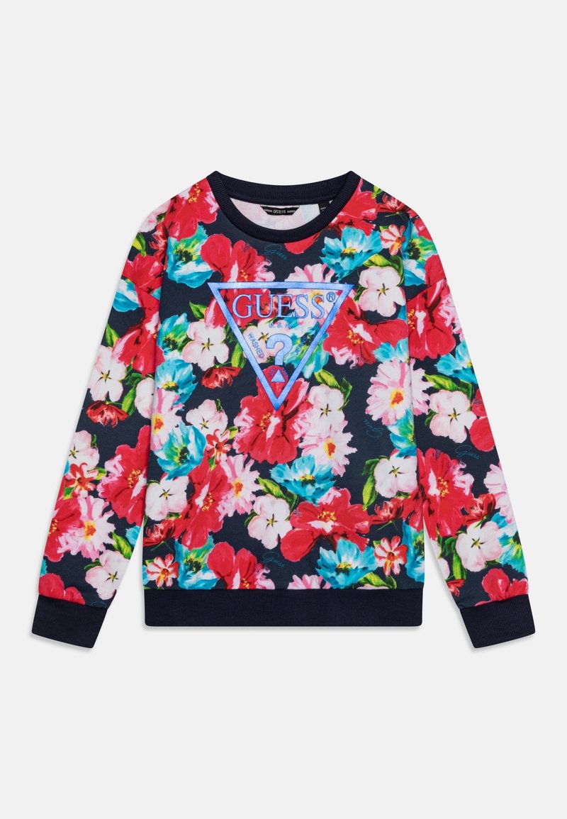Sweat-shirt bleu marine avec motif floral rose, rouge et bleu, arborant un grand triangle bleu avec le logo "GUESS" et un point d'interrogation sur le devant.