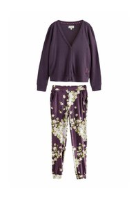 Purple ribbed cardigan with V-neck and buttons, paired with floral-patterned pants in shades of purple, white, and green.