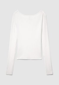 White long-sleeve ribbed top with a wide neckline and fitted design, featuring textured fabric and clean edges.