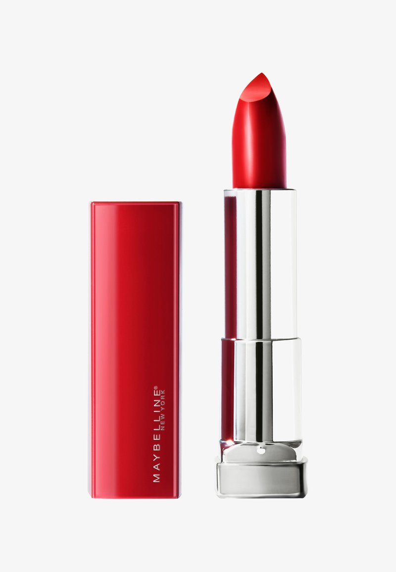 Rouge à lèvres dans un tube argenté avec une finition brillante. Le capuchon est rouge uni et le raisin de rouge à lèvres a une pointe acérée pour une application précise.