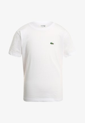 T-shirt de algodão branca com decote redondo e mangas curtas, apresentando um pequeno logótipo de crocodilo bordado em verde no lado esquerdo do peito.
