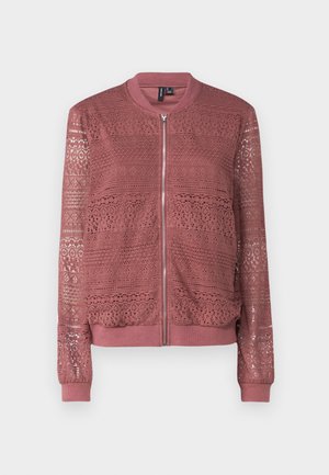 Rose-colored bomber jacket with intricate lace details and a zip front. Ribbed cuffs and hem, providing a textured design throughout.