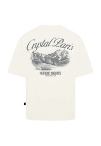 White cotton t-shirt featuring a gray mountain landscape graphic and text stating "Crystal Paris" and "NORDIC NIGHTS" on the back.