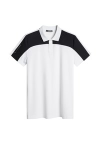 Vit polo skjorta med svarta detaljer på axlar och ärmar. Har en krage och knäppning med tre knappar. Slät, lättviktig tyg.