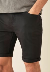 Next STRETCH  - Farkkushortsit - black
