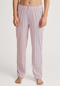 Ljusrosa pyjamasbyxor med marinblå vertikala ränder, elastisk midja och avslappnad passform, med en mjuk och slät textur.