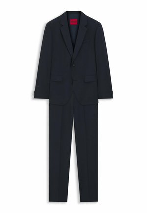 Costume deux pièces bleu marine foncé avec blazer à un bouton et pantalon droit assorti, étiquette Hugo à l'intérieur du col.