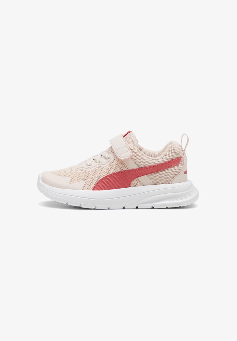 Light pink athletic shoe with red accents, mesh upper, velcro strap, and a cushioned white sole. Features a textured side panel.