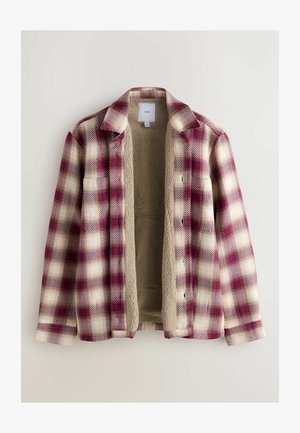 Giacca in flanella con motivo a quadri bordeaux e crema, foderata in morbido pile beige. Caratterizzata da scollo con collo e chiusura frontale con bottoni.